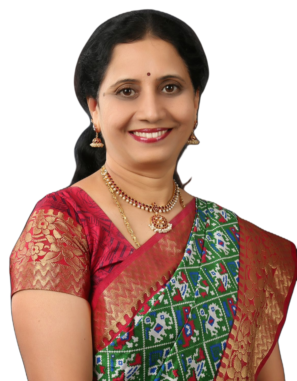 Studio portrait of Dr. P. Lakshmi Satish in a red and gold saree.